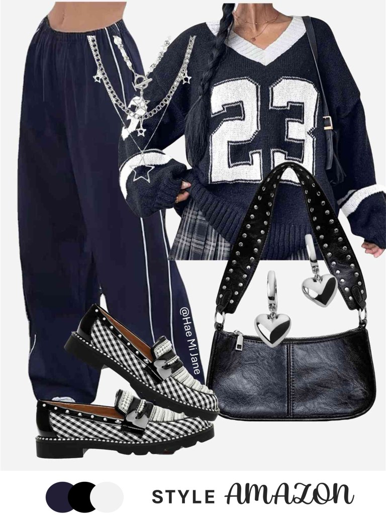 Oversized varsity sweater, navy wide-leg trousers, preppy-cool style.