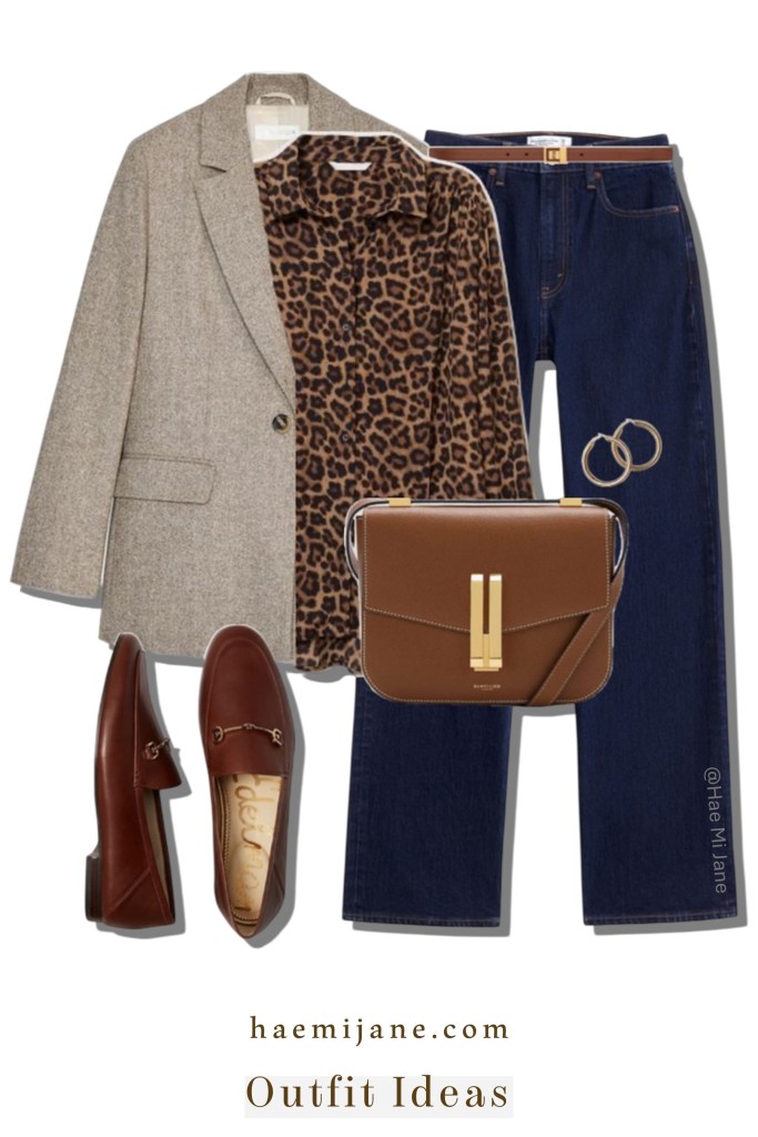Elevate your office wardrobe with this modern academic look featuring a classic herringbone blazer layered over a bold leopard print blouse. Paired with dark wash denim and cognac leather horsebit loafers, this outfit perfectly balances professional structure with high-fashion flair.